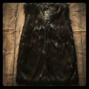 Black faux fur vest